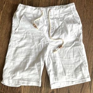 White linen shorts.